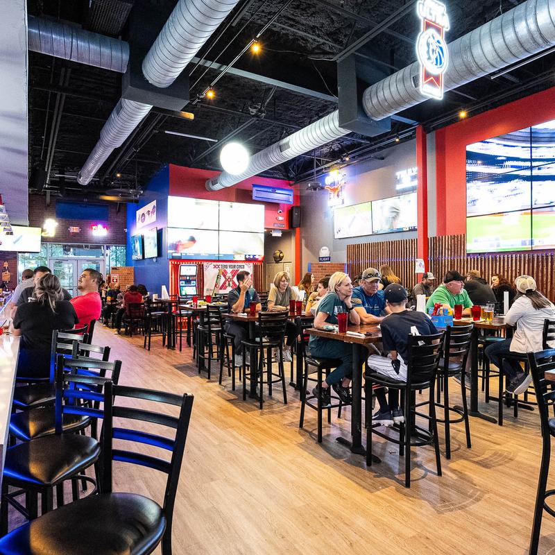 Guests at tables at the restaurant.